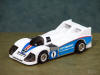 Gobots Crasher in White Porsche 956 Racing Car Mode